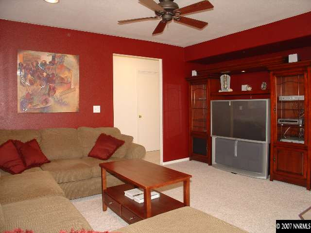 7765 Welsh Drive Reno, NV 89506 - Photo 3 of 9 a living room with furniture
