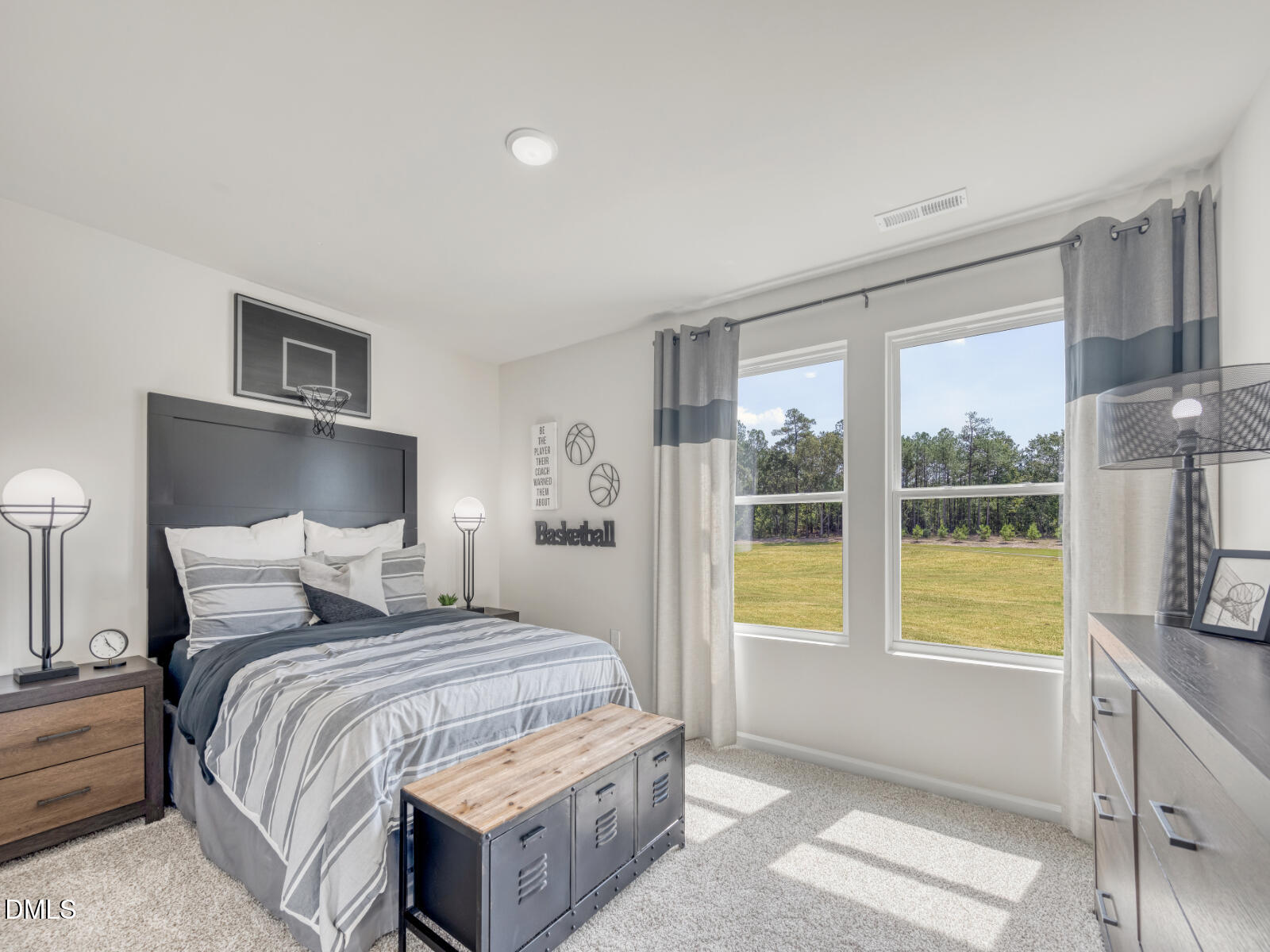 252 Karlov Road Garner, NC 27529 - Photo 10 of 12 a bedroom with a large bed and a large window