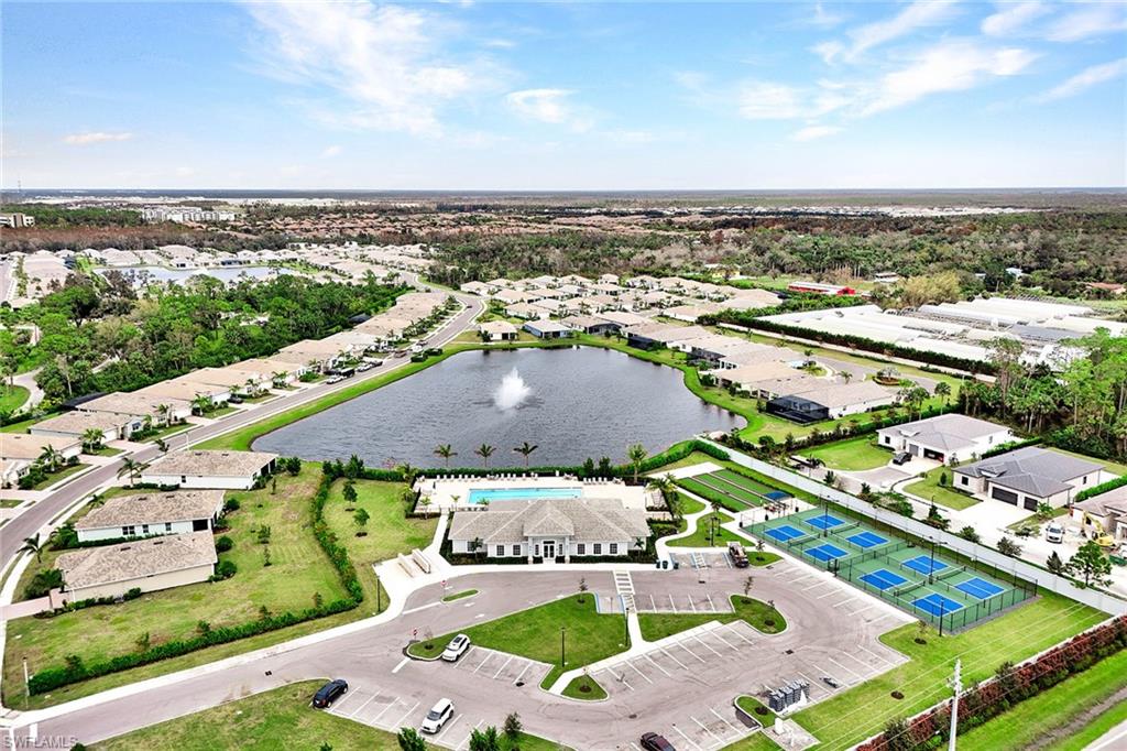 267 Tamarindo Lane Naples, FL 34114 - Photo 38 of 45 an aerial view of a city