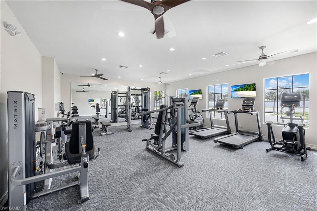 267 Tamarindo Lane Naples, FL 34114 - Photo 43 of 45 a view of a room with gym equipment
