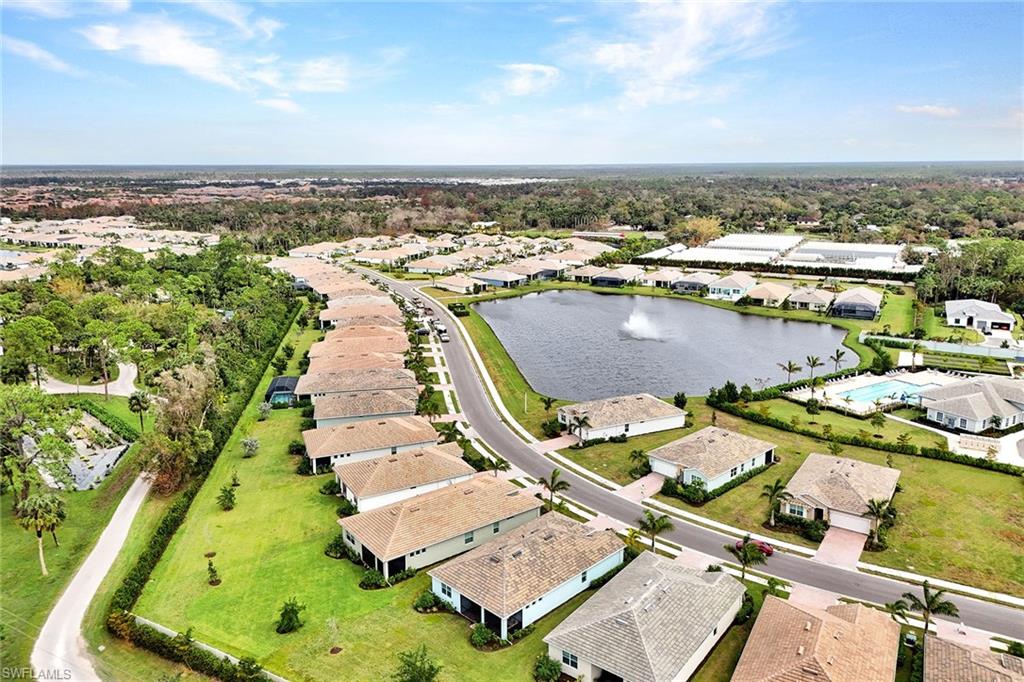 267 Tamarindo Lane Naples, FL 34114 - Photo 45 of 45 an aerial view of residential houses with outdoor space
