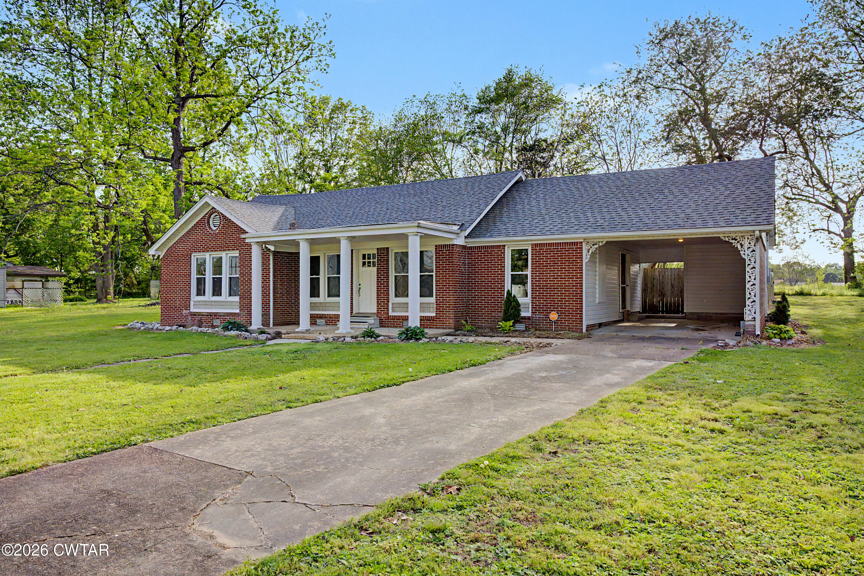 113 Church Street Gleason, TN 38229 - Photo 11 of 21 a view of a house with a yard