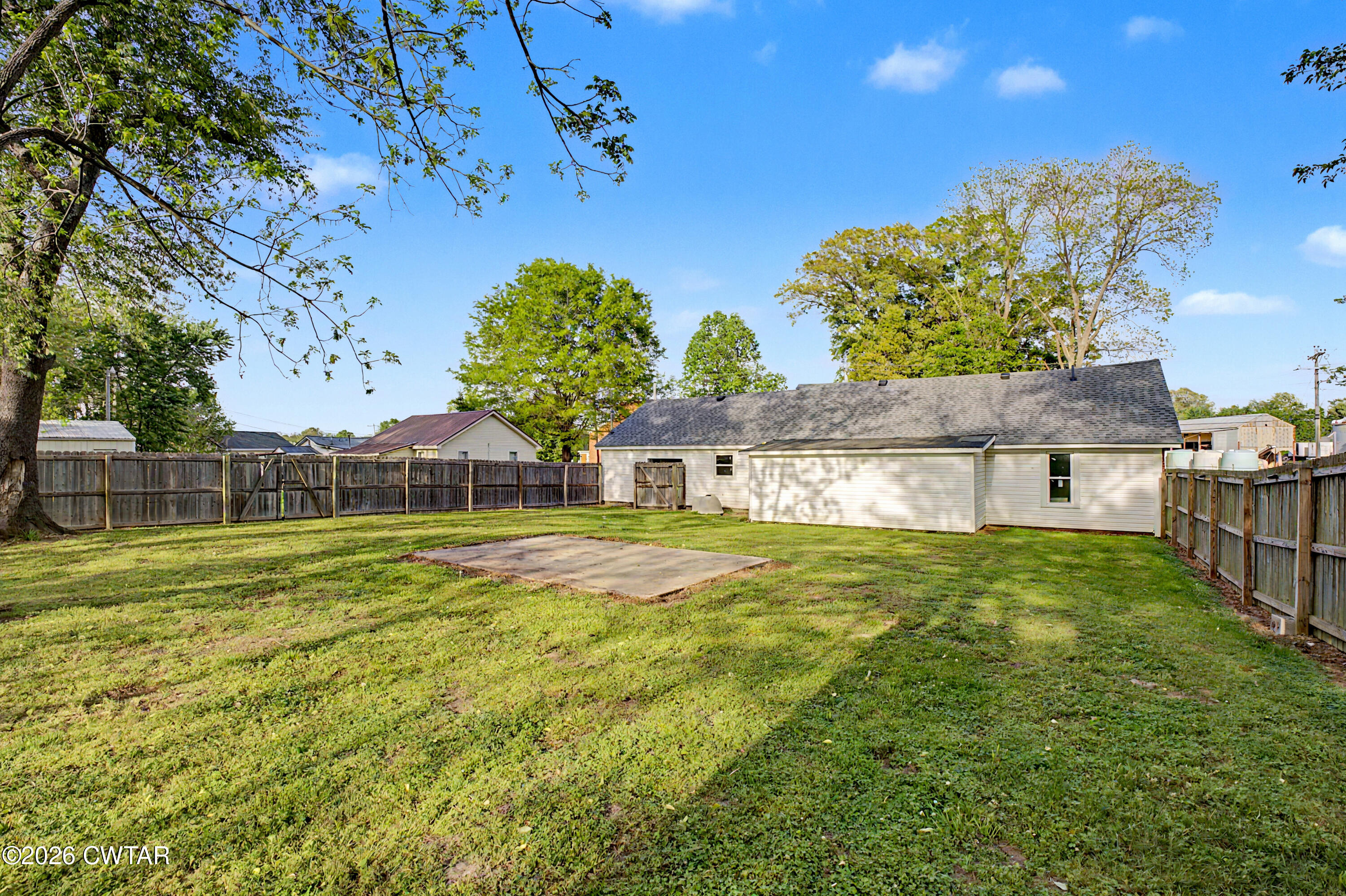 113 Church Street Gleason, TN 38229 - Photo 3 of 21 a view of a house with a big yard