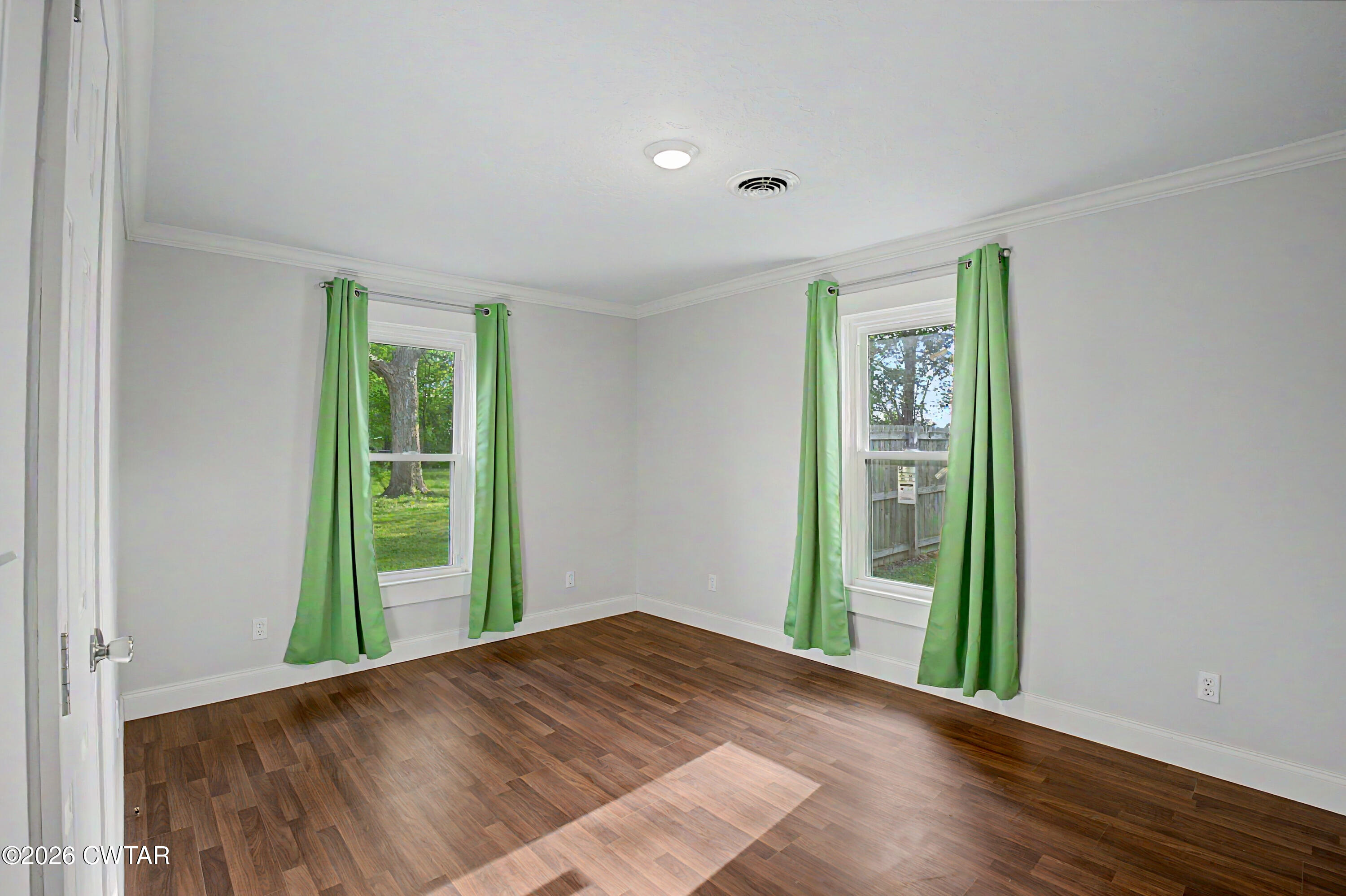 113 Church Street Gleason, TN 38229 - Photo 5 of 21 an empty room with yard and outdoor view