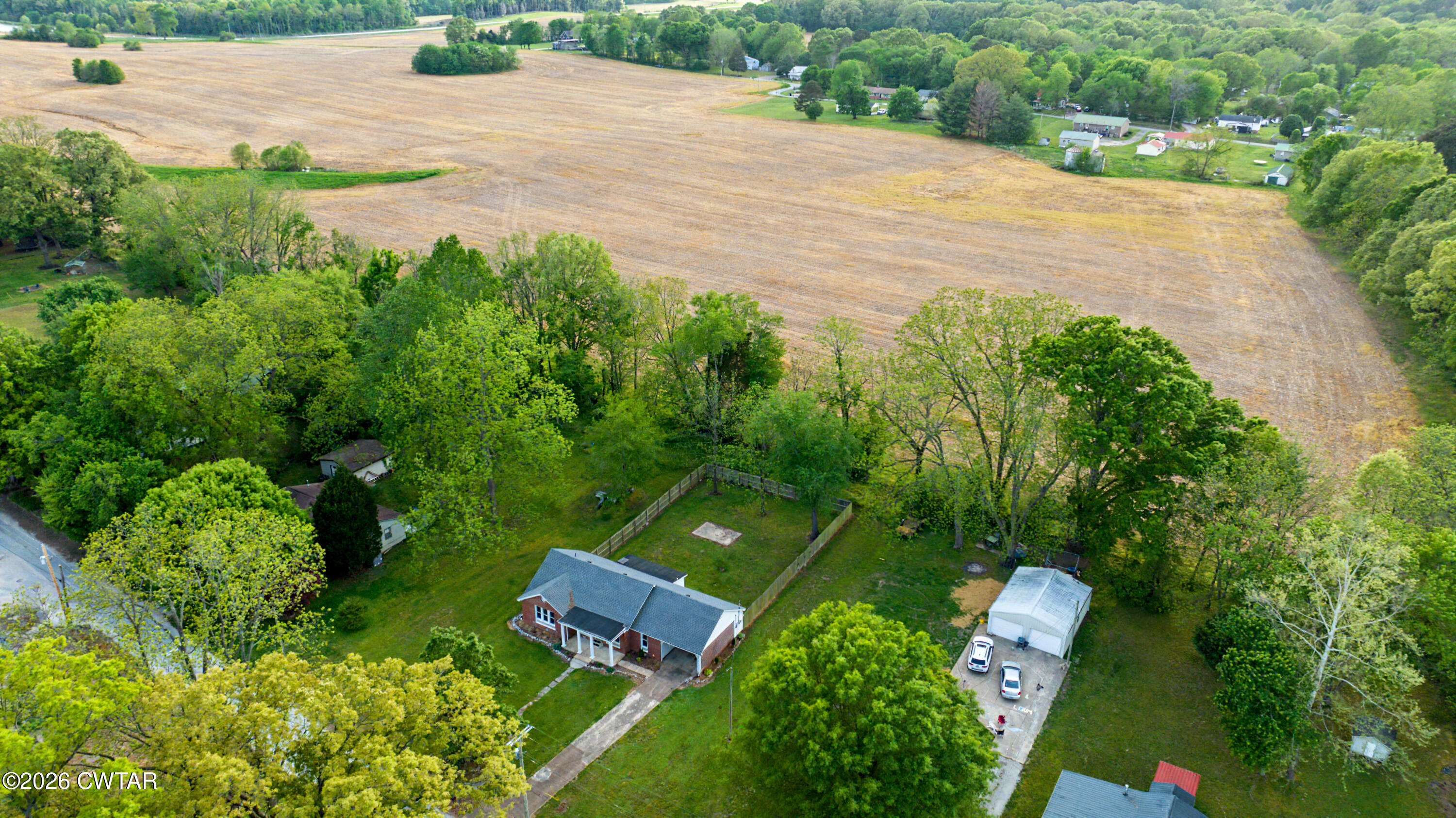 113 Church Street Gleason, TN 38229 - Photo 9 of 21 an aerial view of a house with yard