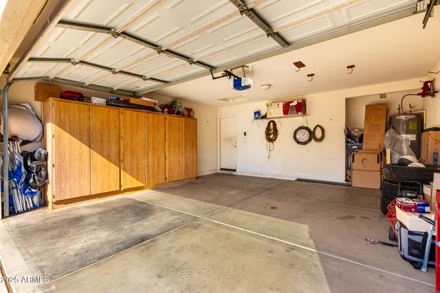 a view of a garage with storage