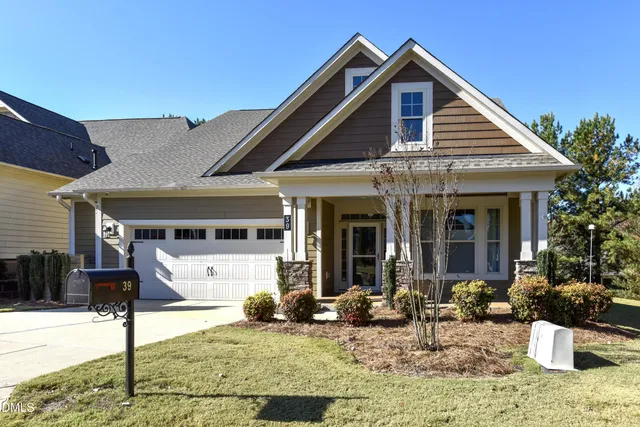 a backyard of a house with seating space