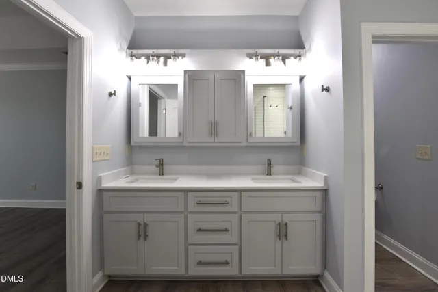 a white bath tub sitting next to a white toilet