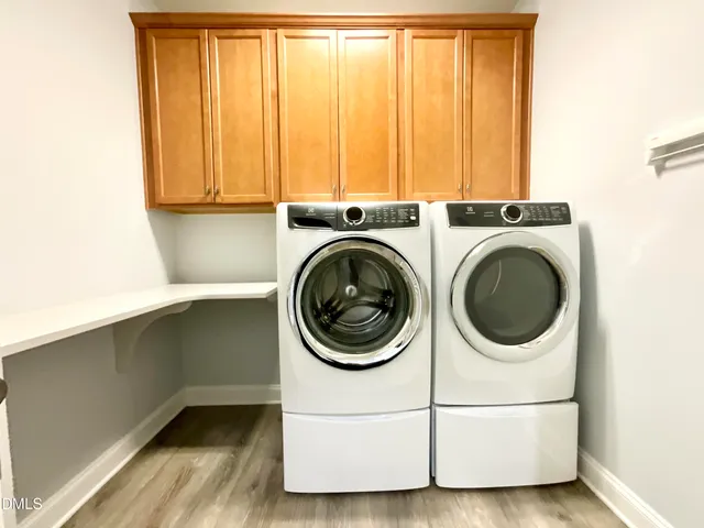 a white bath tub sitting in a bathroom