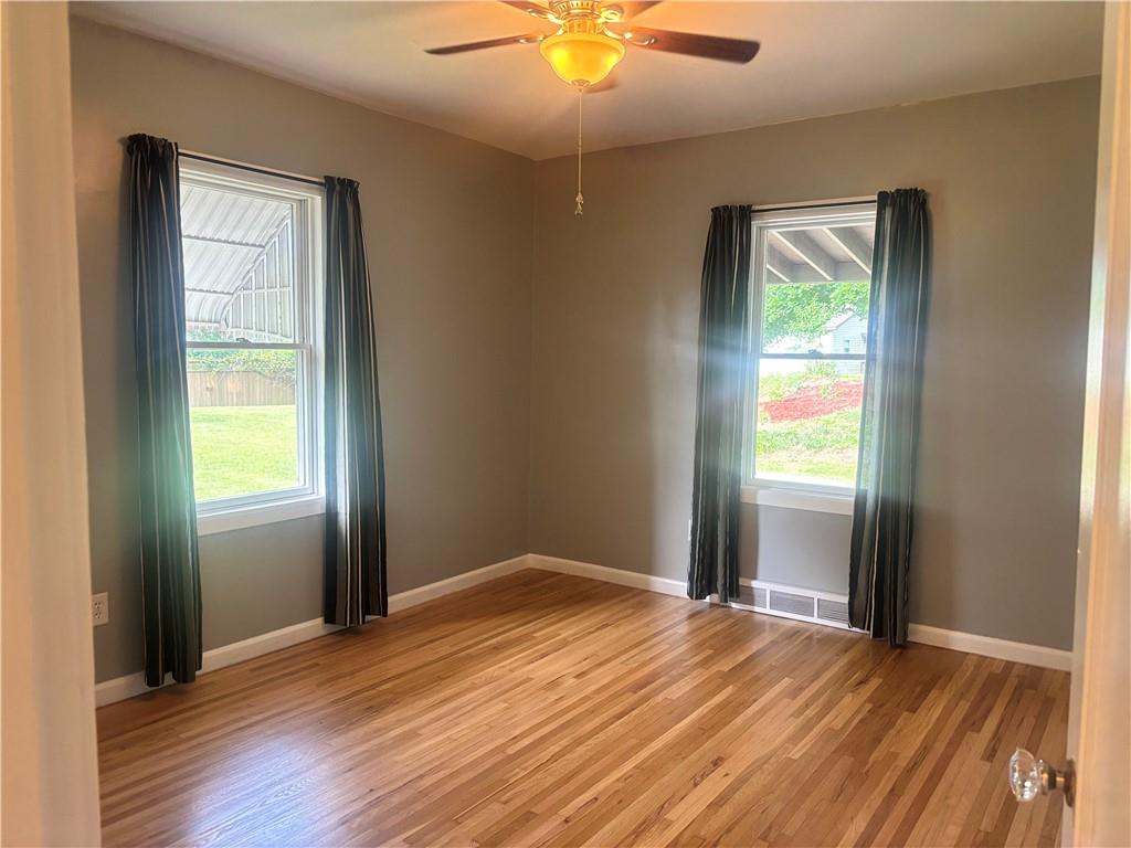 26 Mt View Drive Burgettstown, PA 15021 - Photo 20 of 45 an empty room with window and wooden floor