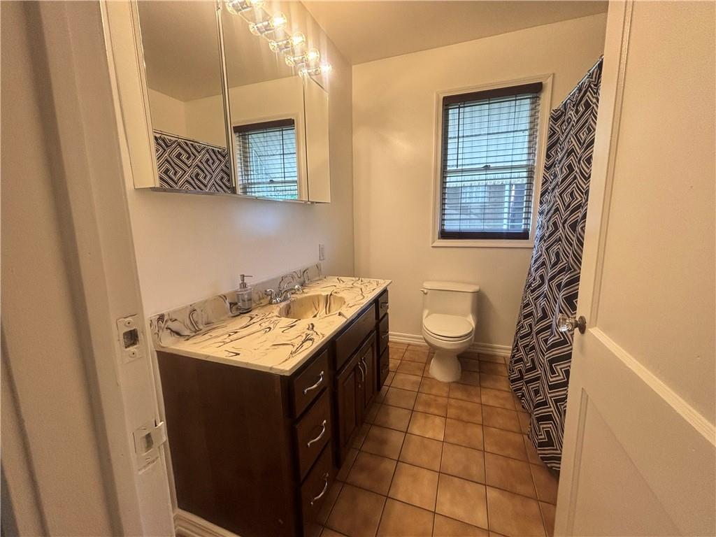 26 Mt View Drive Burgettstown, PA 15021 - Photo 22 of 45 a bathroom with a sink a toilet and a mirror