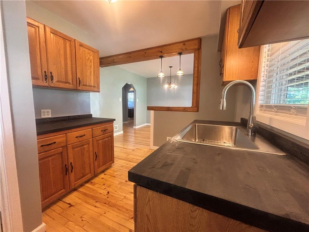 26 Mt View Drive Burgettstown, PA 15021 - Photo 24 of 45 a kitchen with stainless steel appliances granite countertop a sink a stove and a refrigerator
