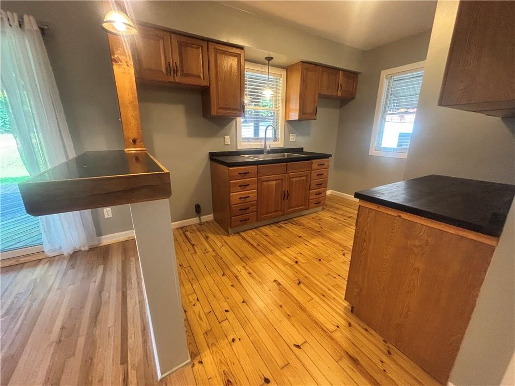 26 Mt View Drive Burgettstown, PA 15021 - Photo 30 of 45 a kitchen with a sink and wooden floor