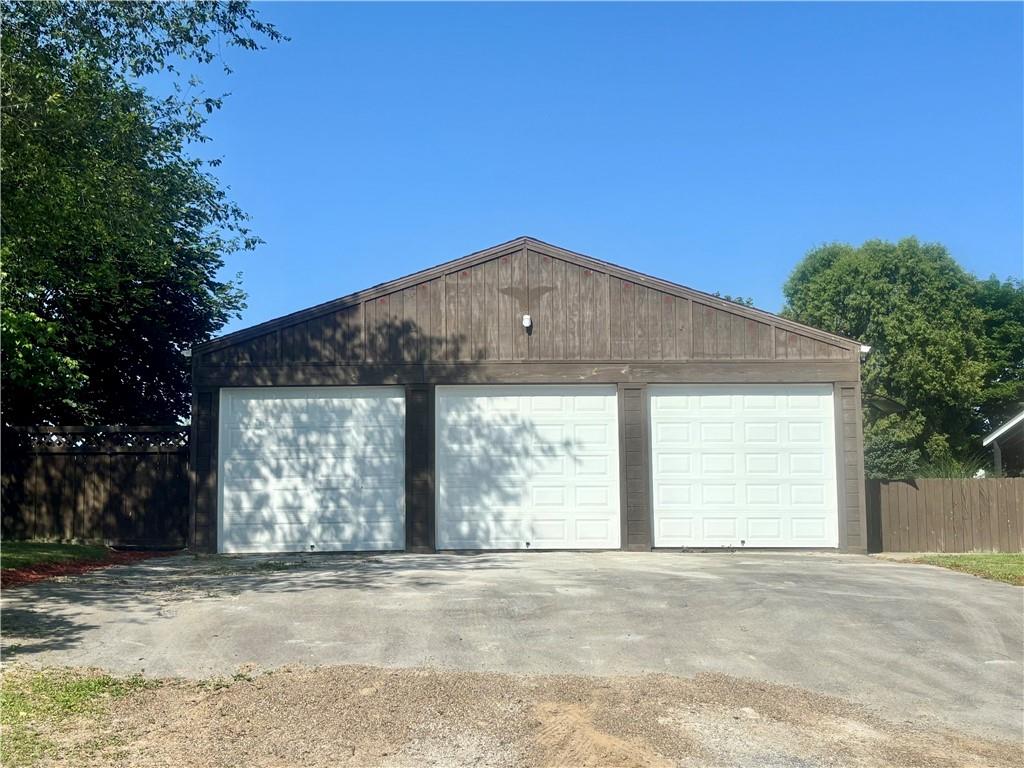 26 Mt View Drive Burgettstown, PA 15021 - Photo 7 of 45 a front view of a house with a yard and garage