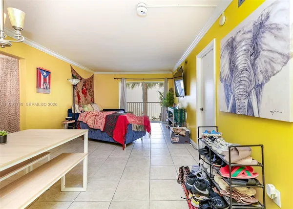 a bed room with a bed and a couch