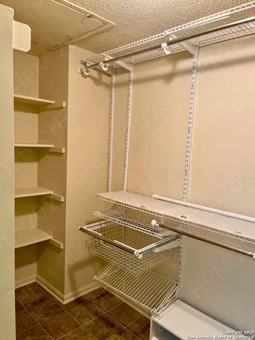 a bathroom with a window and a shower