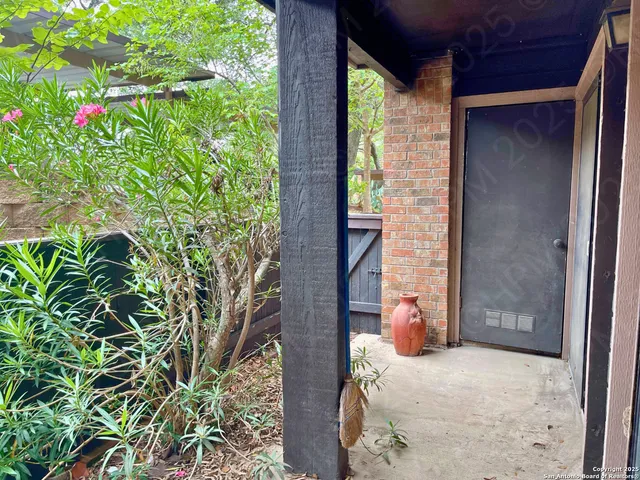 a backyard of a house with seating space