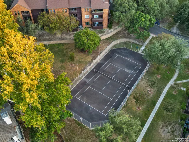 a view of backyard with green space