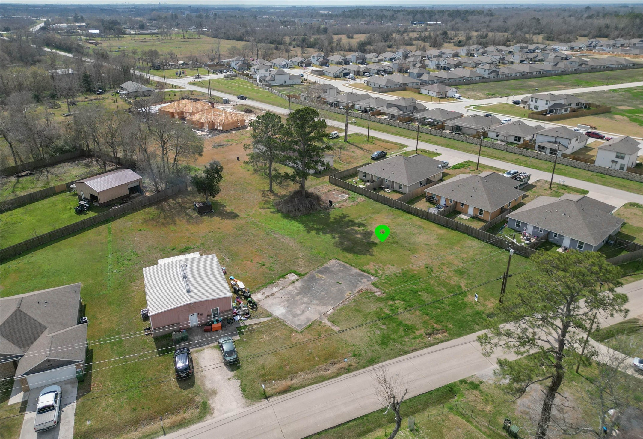 0 West Linney Street Dayton, TX 77535 - Photo 2 of 6 an aerial view of residential houses with outdoor space