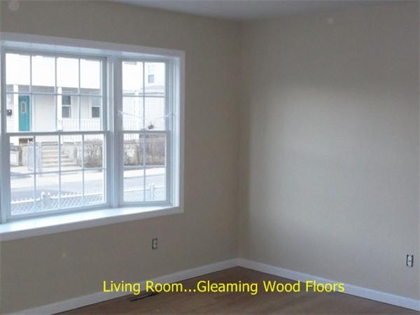 75 Tyler Street Springfield, MA 01109 - Photo 3 of 14 a view of an empty room with a window