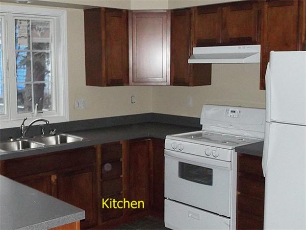 75 Tyler Street Springfield, MA 01109 - Photo 5 of 14 a utility room with sink dryer and washer