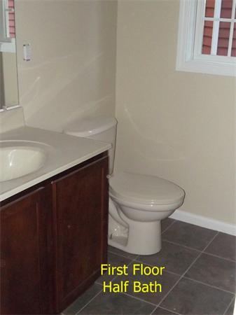 75 Tyler Street Springfield, MA 01109 - Photo 6 of 14 a bathroom with a toilet and a sink