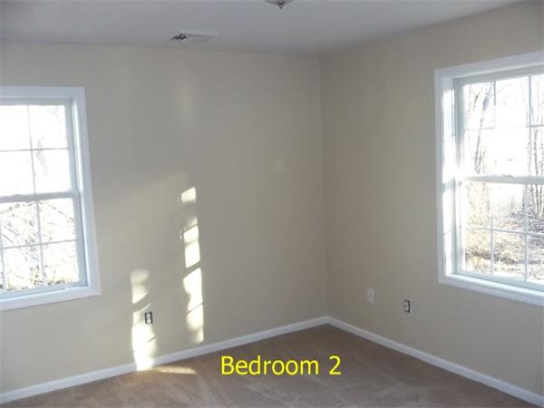 75 Tyler Street Springfield, MA 01109 - Photo 10 of 14 an empty room with a window