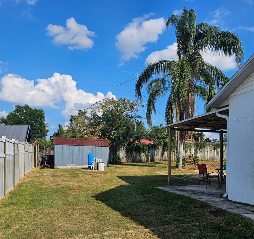 13599 Southeast 51st Terrace Summerfield, FL 34491 - Photo 3 of 44 a view of a house with a yard