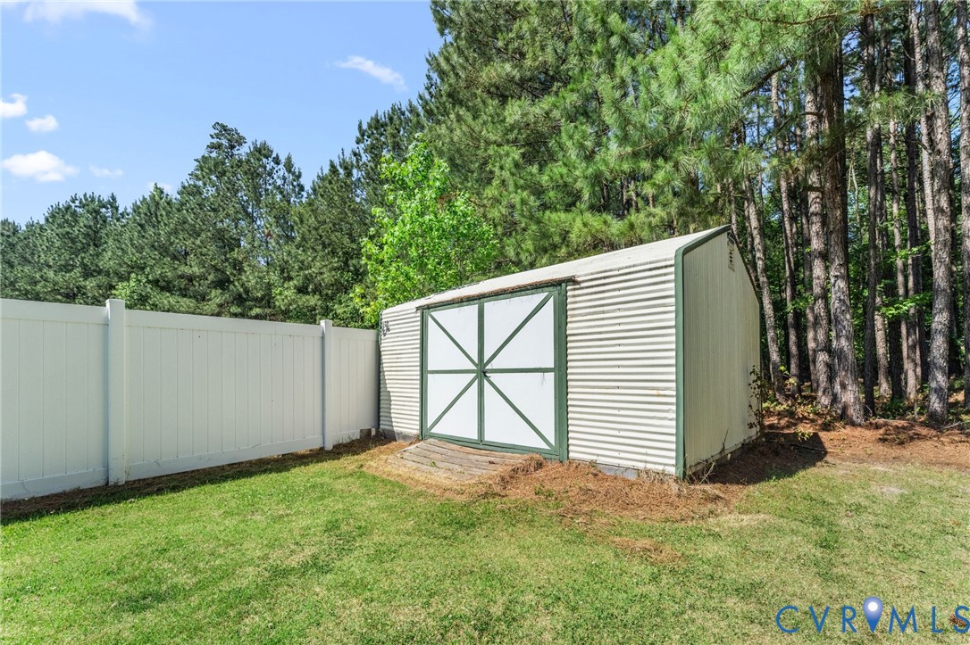 3120 Denise Road Petersburg, VA 23805 - Photo 12 of 51 Corrugated metal storage shed featuring a double d