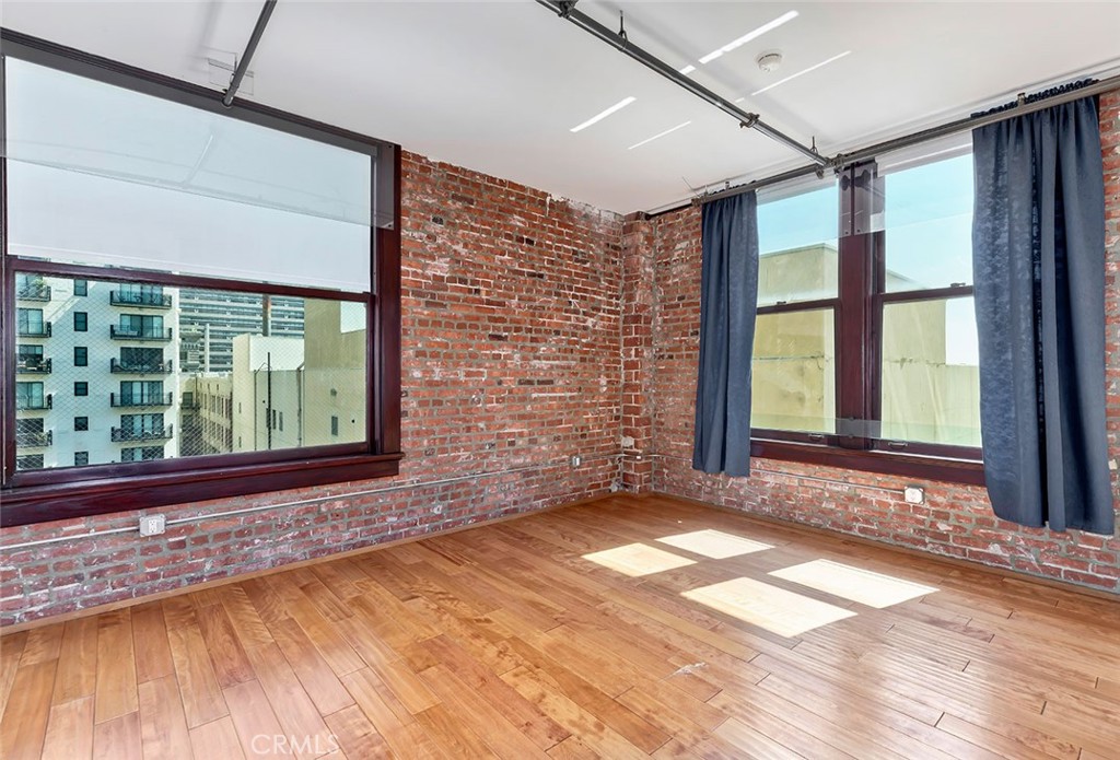 460 South Spring Street, Unit 802 Los Angeles, CA 90013 - Photo 21 of 25 a view of a room with a large window