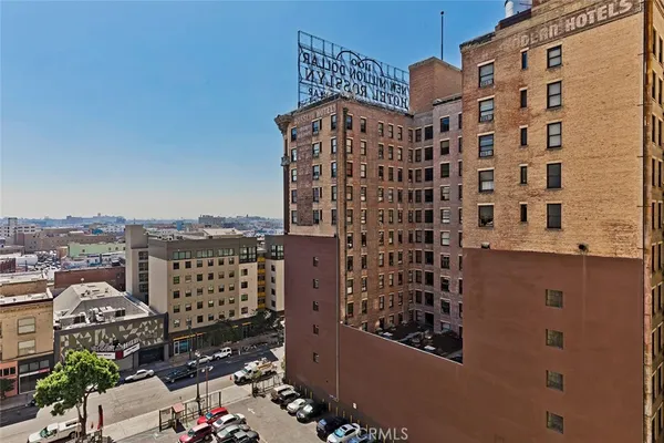 a view of a building with a yard