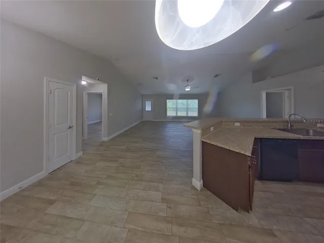 a view of a kitchen cabinets and a sink
