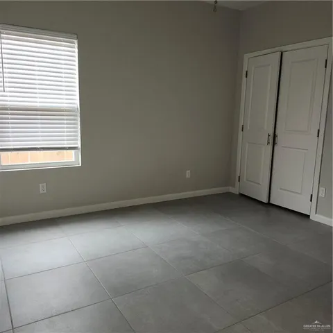 a view of a room that has a window in it