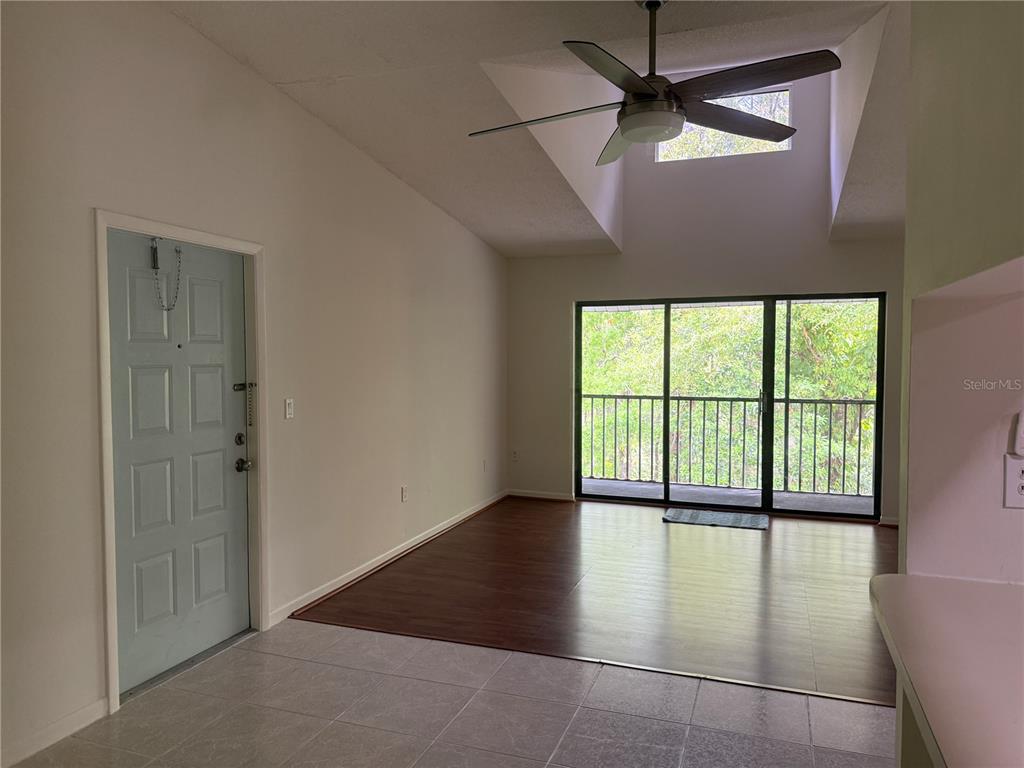 1236 Pine Ridge Circle West, Unit G3 Tarpon Springs, FL 34688 - Photo 7 of 18 a view of an empty room with a window