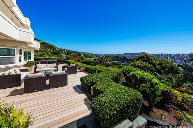 a view of a terrace with sitting area