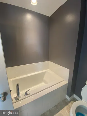 a bathroom with a bathtub