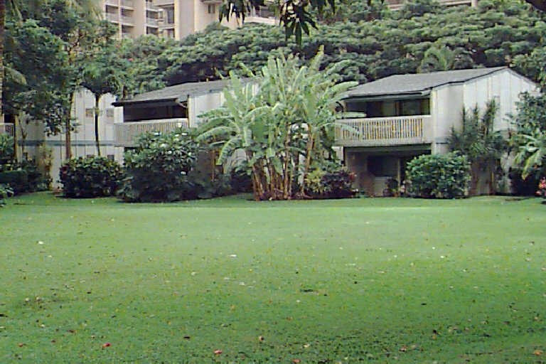 4435 Lower Honoapiilani Road, Unit 144 Lahaina, HI 96761 - Photo 1 of 1 a front view of house with yard and green space