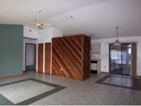 585 Northwest Higgs Palm Bay, FL 32907 - Photo 2 of 12 a view of a livingroom with staircase