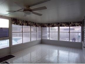 585 Northwest Higgs Palm Bay, FL 32907 - Photo 4 of 12 a view of an empty room with a window