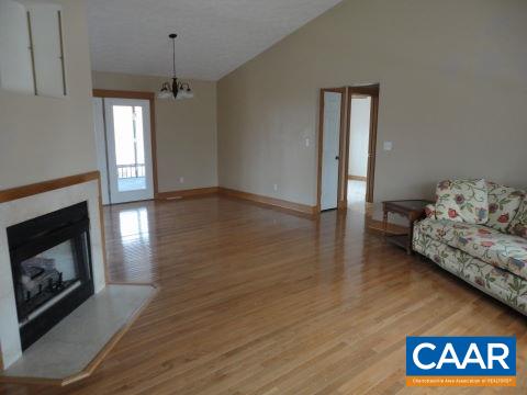 26 Brougham Road Palmyra, VA 22963 - Photo 2 of 20 a view of livingroom window wooden floor and fire place