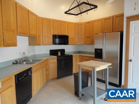 26 Brougham Road Palmyra, VA 22963 - Photo 5 of 20 a kitchen with a sink appliances and cabinets