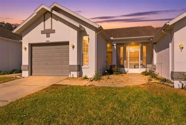 a view of a house with a patio