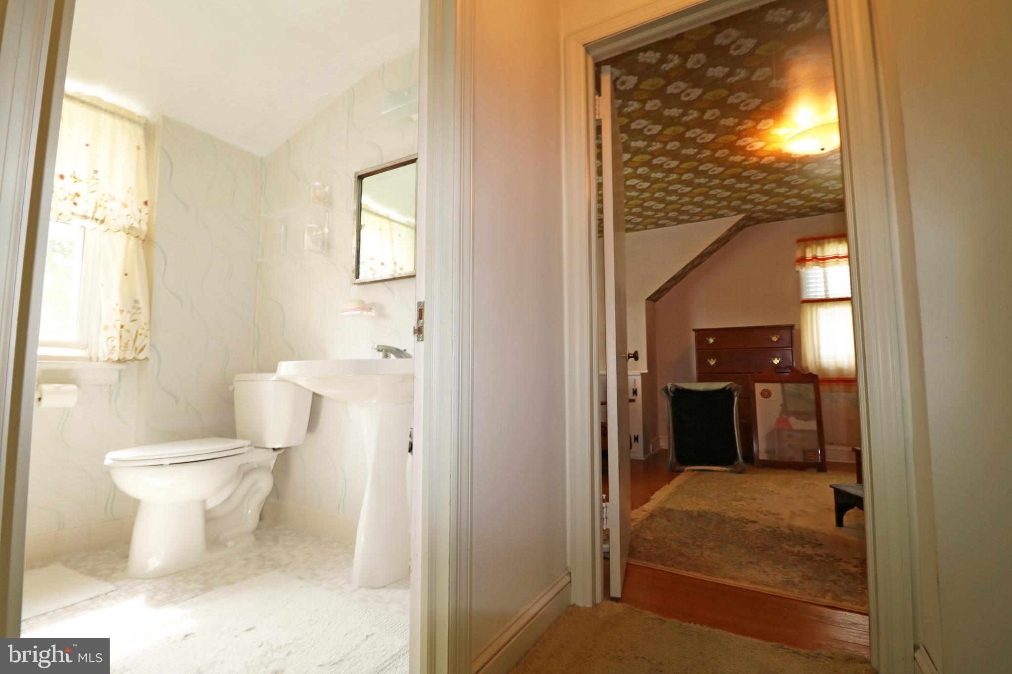 530 Hempstead Road Springfield, PA 19064 - Photo 22 of 36 a bathroom with a toilet and a sink