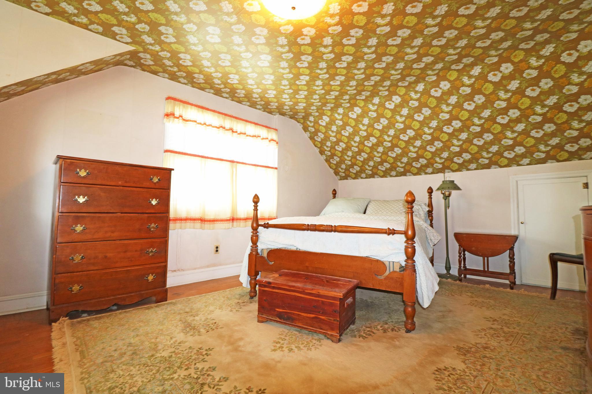 530 Hempstead Road Springfield, PA 19064 - Photo 23 of 36 a bedroom with a bed and a dresser