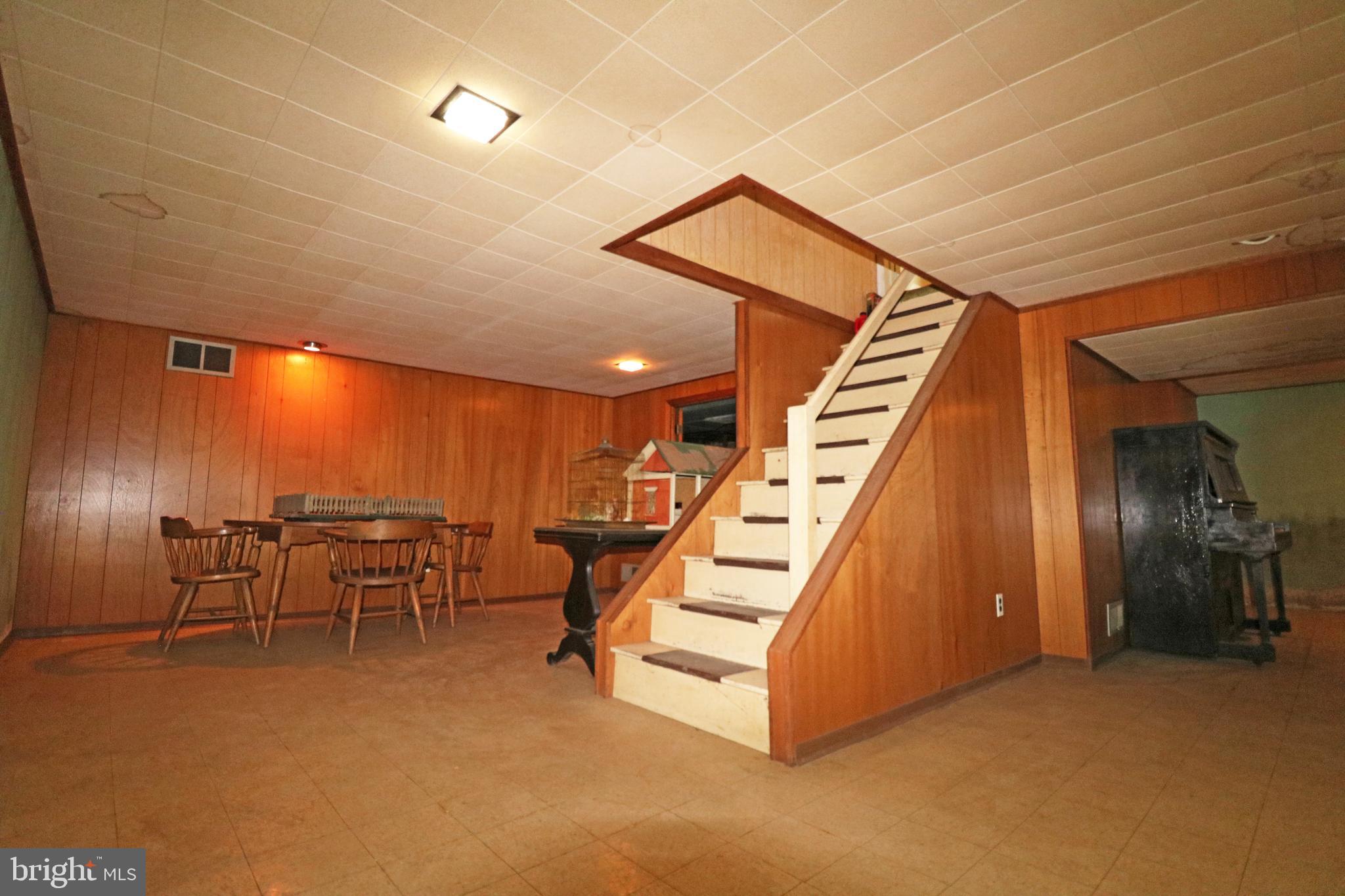 530 Hempstead Road Springfield, PA 19064 - Photo 25 of 36 a view of a livingroom with furniture and stairs
