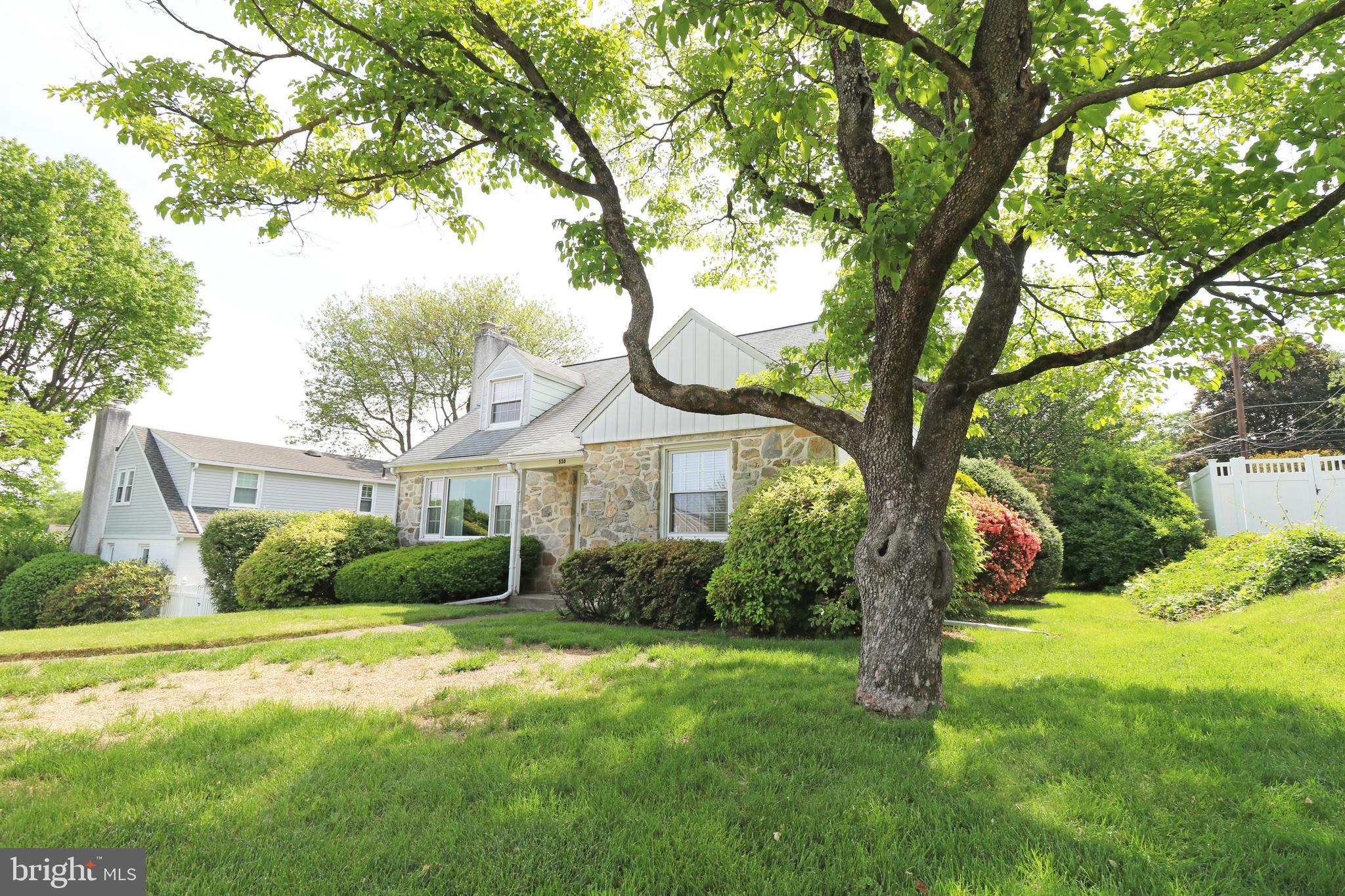 530 Hempstead Road Springfield, PA 19064 - Photo 4 of 36 a front view of house with yard and green space