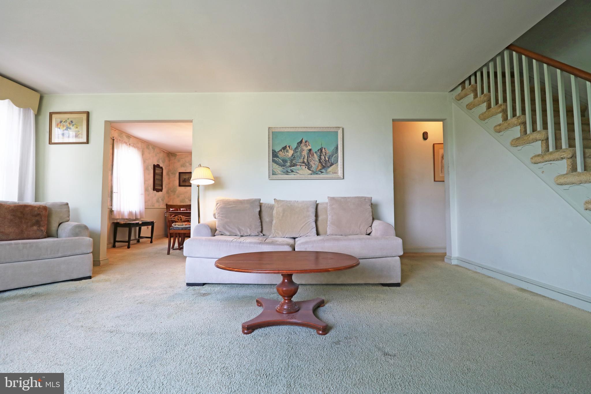 530 Hempstead Road Springfield, PA 19064 - Photo 8 of 36 a living room with furniture and a table