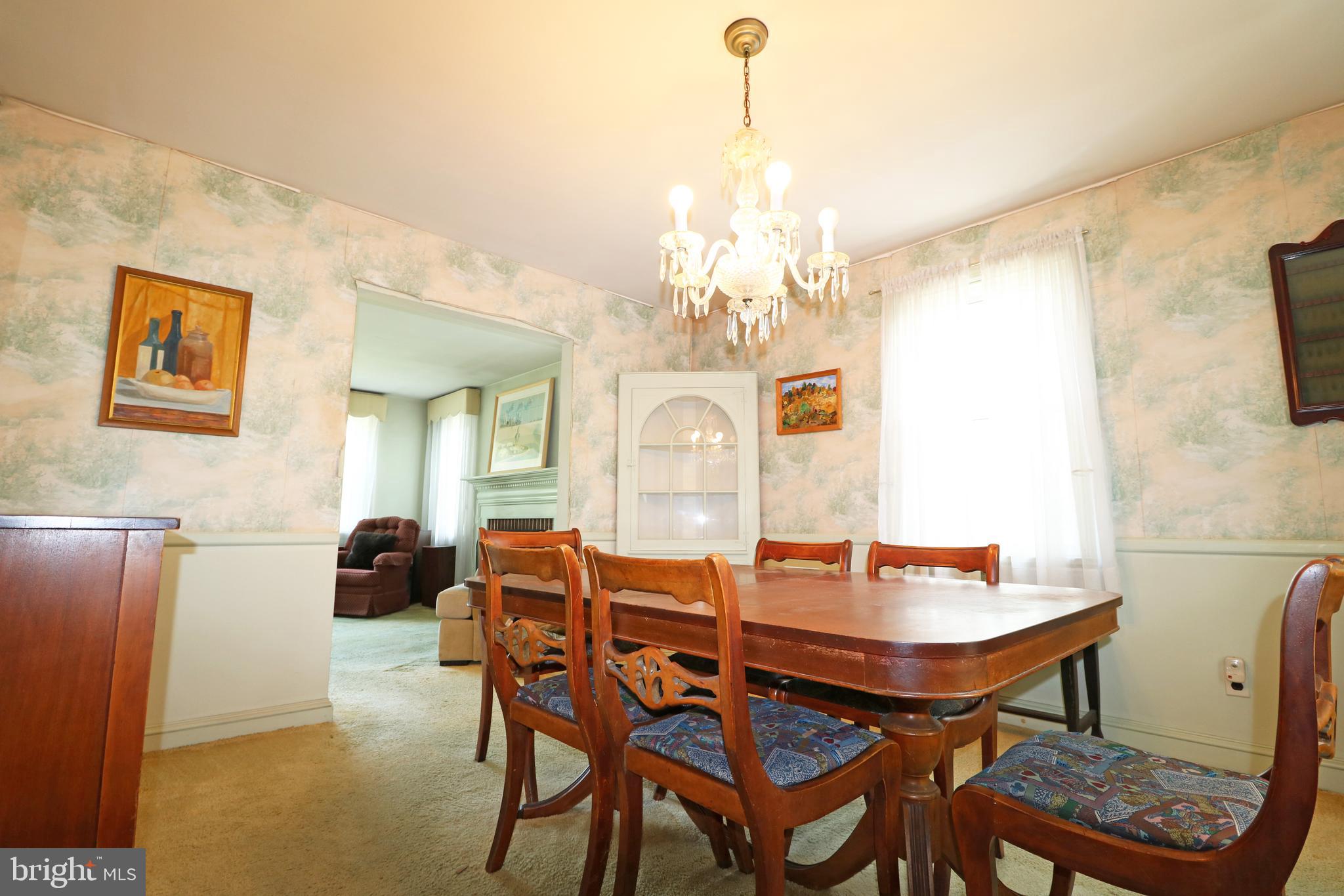 530 Hempstead Road Springfield, PA 19064 - Photo 9 of 36 a view of a dining room with furniture and chandelier