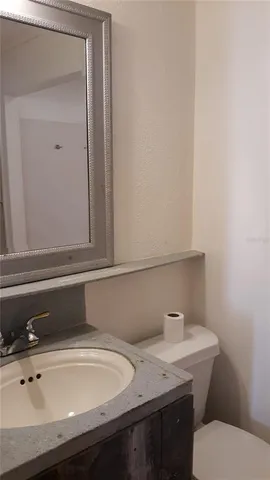 a bathroom with a sink and a toilet