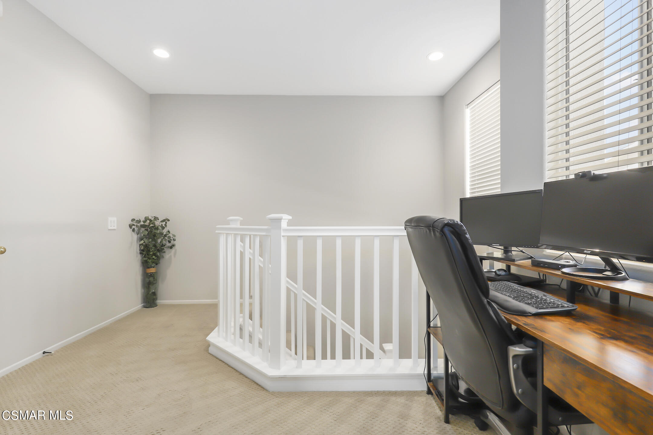 4006 Brindisi Place Moorpark, CA 93021 - Photo 14 of 32 a view of workspace with wooden floor windows